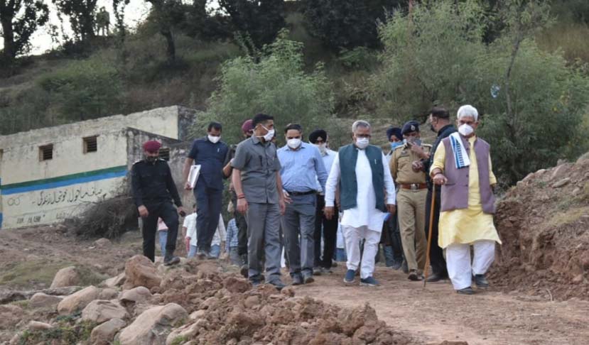 LG walks 4 Kms to meet kins of youth killed in Shopian fake encounter, assures Justice