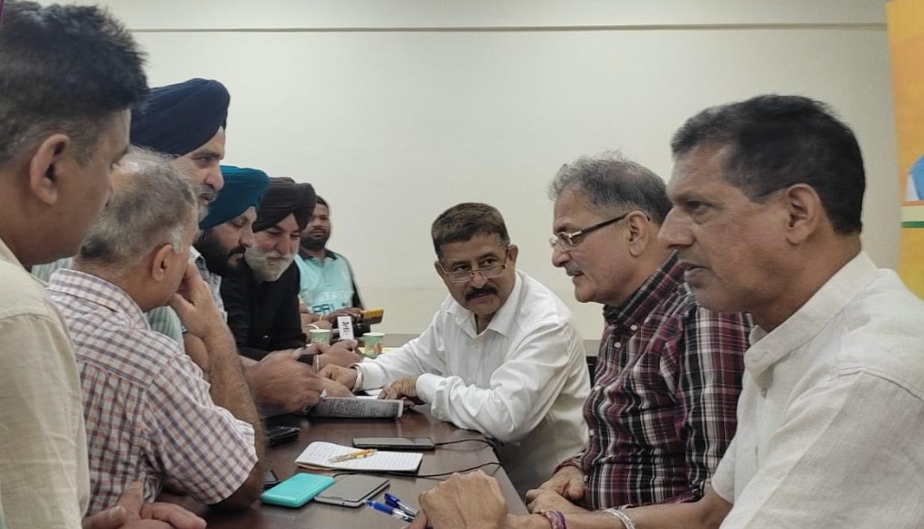 Kavinder Gupta listens to the public grievances