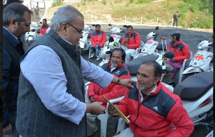 Governor distributes Tri-cycles among physically challenged persons