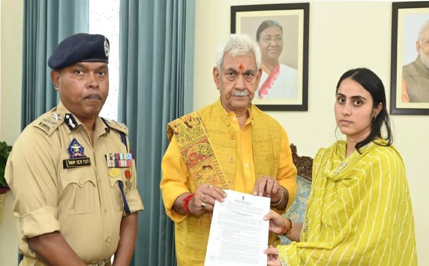LG Manoj Sinha hands over appointment letter to wife of martyr SI Deepak Sharma