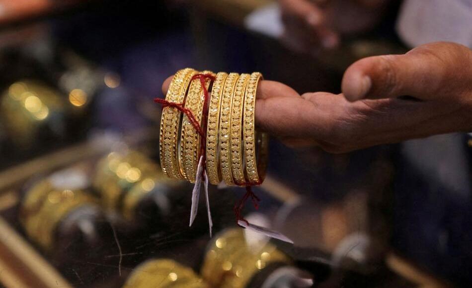 Gold futures rise to Rs 1.56 lakh/10g; ends 3-day decline amid tensions in West Asia