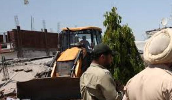 Administration demolishes residences of two drug peddlers in outskirts of Jammu city