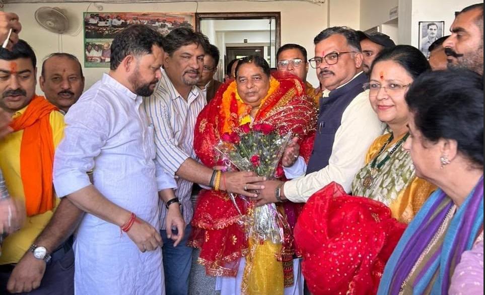 Sat Sharma accorded warm reception at BJP headquarters after filing nomination papers for Rajya Sabha