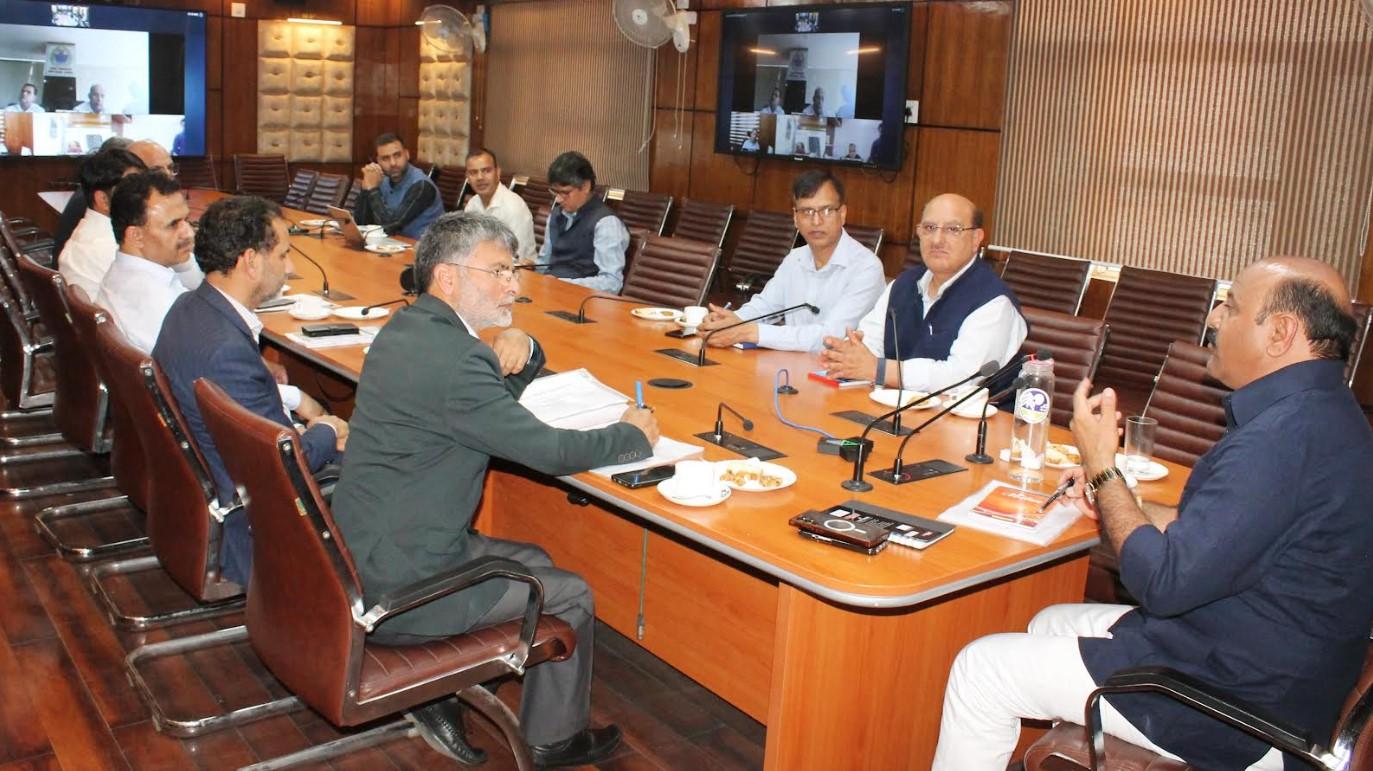 Dy CM reviews performance of J&KKVIB, JKPCC