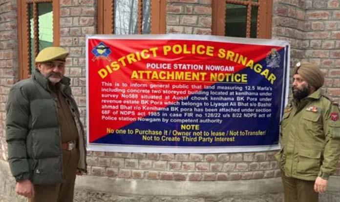 Police attach property of notorious drug peddler under NDPS Act in Srinagar