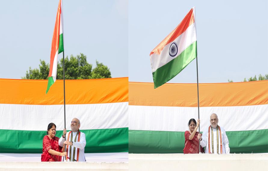 Union Home Minister Amit Shah hoists Tiranga at residence under Har Ghar Tiranga campaign